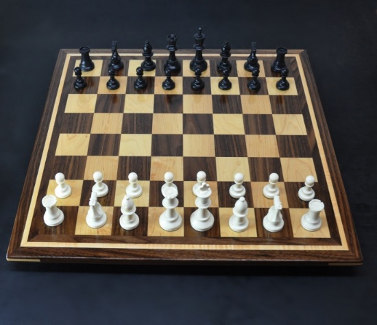 Walnut and Maple Chess Board with Curly Maple inlay frame image